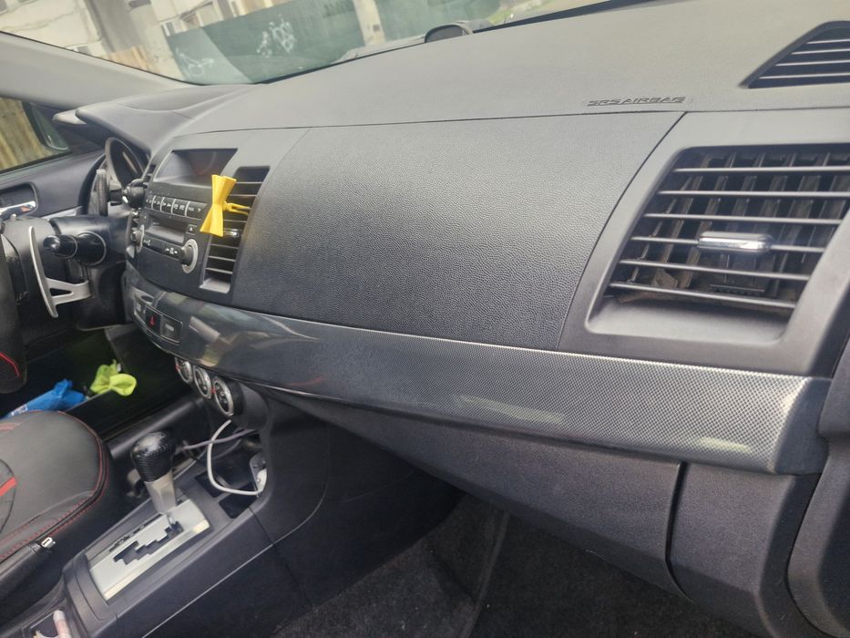 Митсубиши Лансер Х