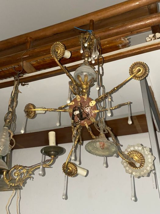 4 candelabros em dourado