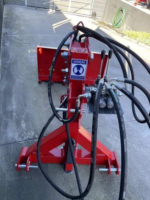 Carregador traseiro com comandos