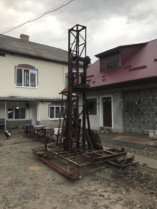 Щогловий підйомник ( будівельний підйомник, будівельний ліфт )