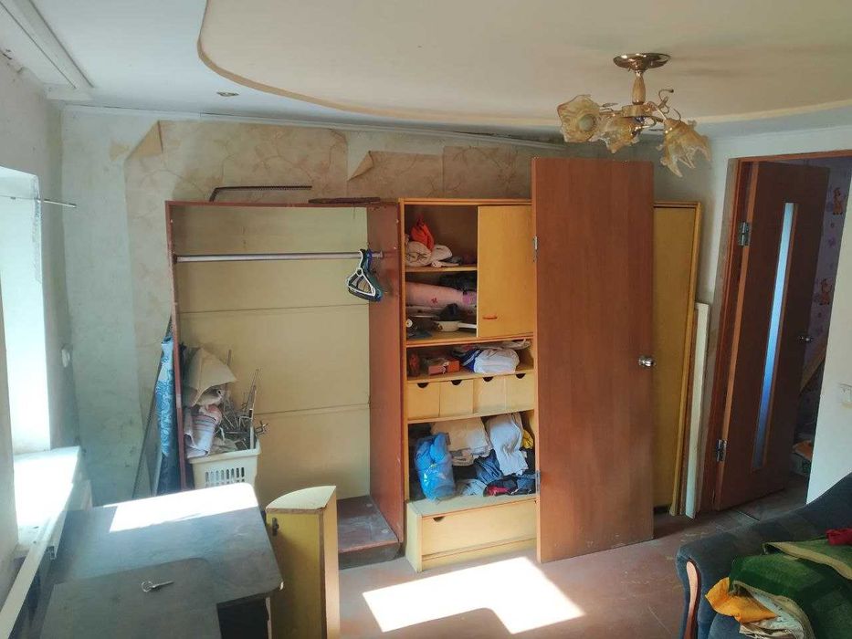 Продажа дома в общем дворе.