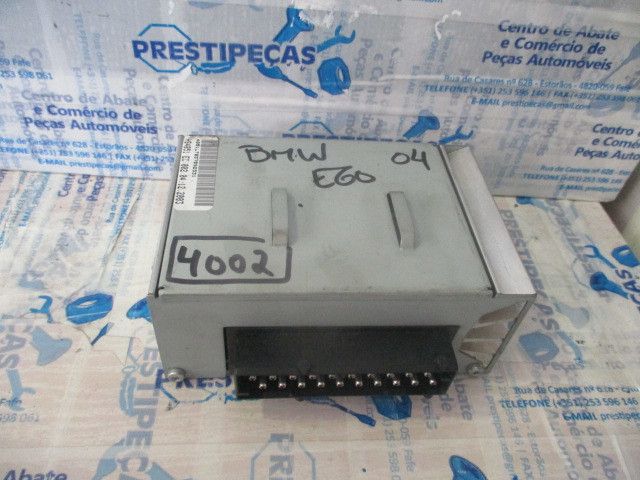 Amplificador de colunas BMW 5 (E60)