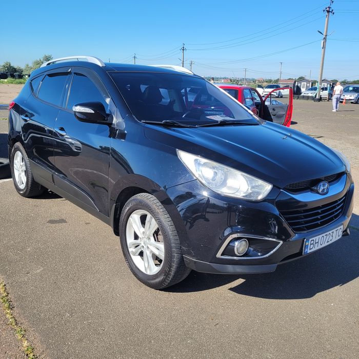 Hyundai ix35 2010 VIN KMHJU81BDBU164064 фото оголошення 2 з 9