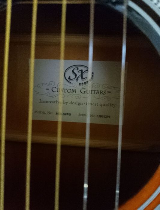 Продам новую акустическую гитару SX