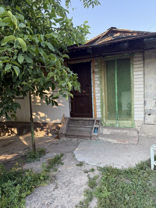 Продам частину будинку (буд.на 3 квартири)+сарай +гараж