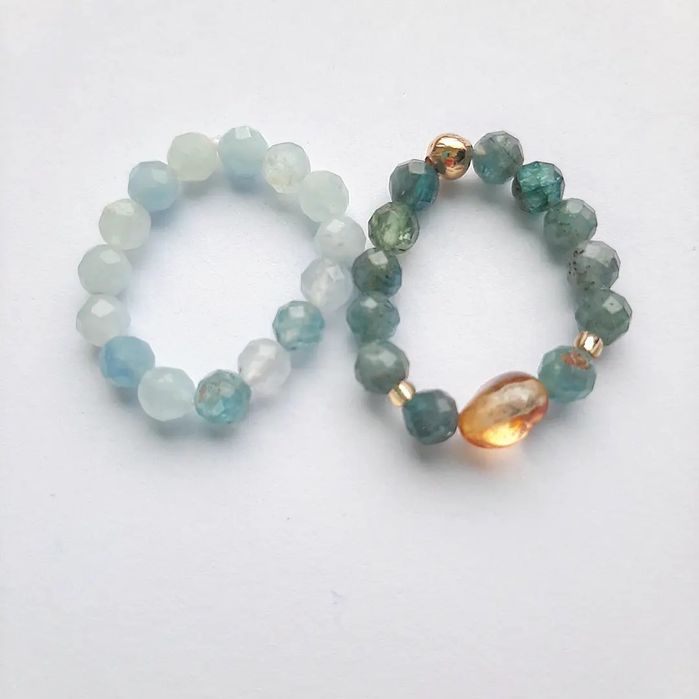 Кольца из жемчуга, аквамарина, чёрной шпинели, апатита и других камней