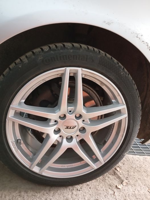 Felgi 5×112 18 cali z oponami Continental