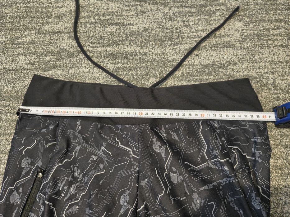 Kalenji Decathlon damskie sportowe spodenki legginsy 3/4 rozmiar M