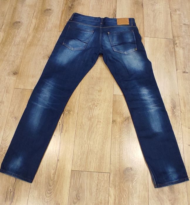 Spodnie Zara man roz. 34