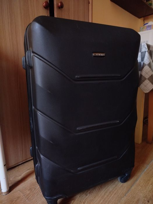 Велика дорожня валіза, міцна, на колесах