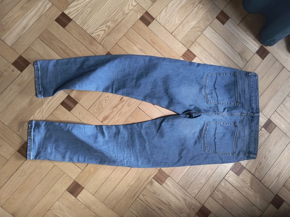 Jeansy męskie ASOS z dziurami W32 L30