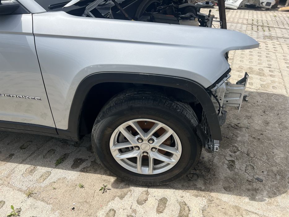 Blotnik przedni prawy jeep grand cherokee wl kolor PSE