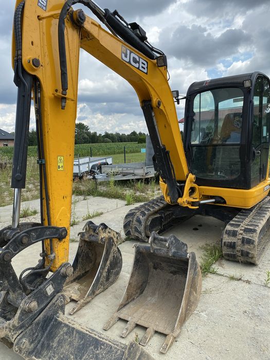 Екскаватор , бобкат