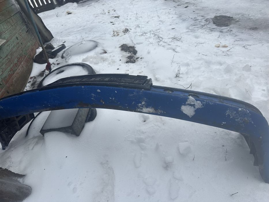 Передній бампер е34