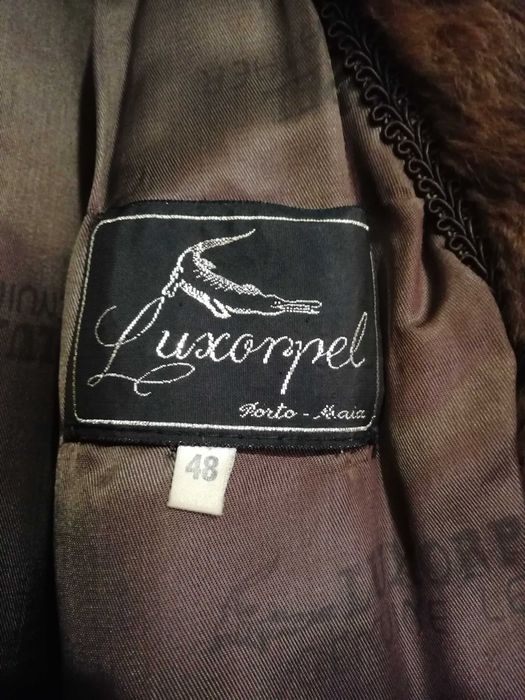 Casaco de pêlo castanho