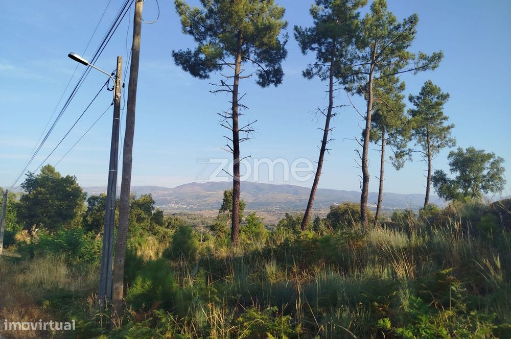 Buildable plot adjacent to 2 public roads with paved surfaces