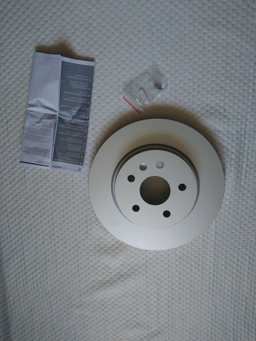 Гальмівний (тормозний) диск Bosch 0986479C71 E1-90R-02C0074/1566  новий в упаковці