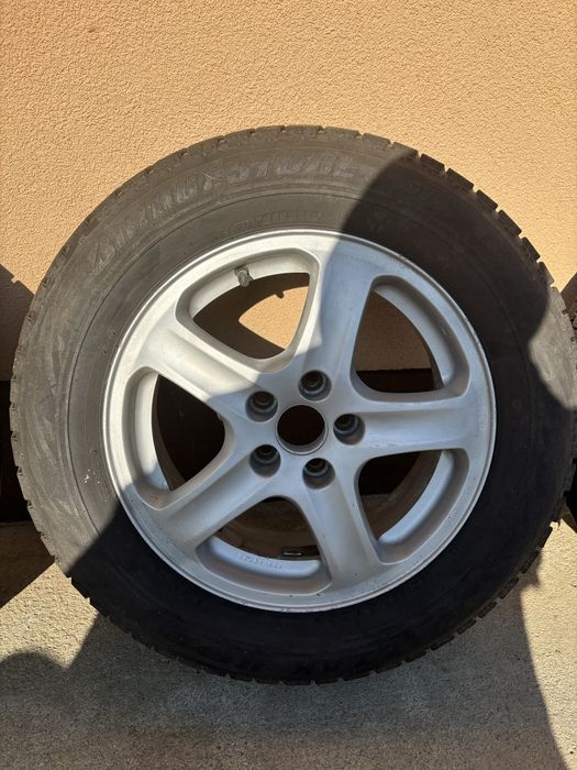 Титани , колеса 5*100  195/65 R15