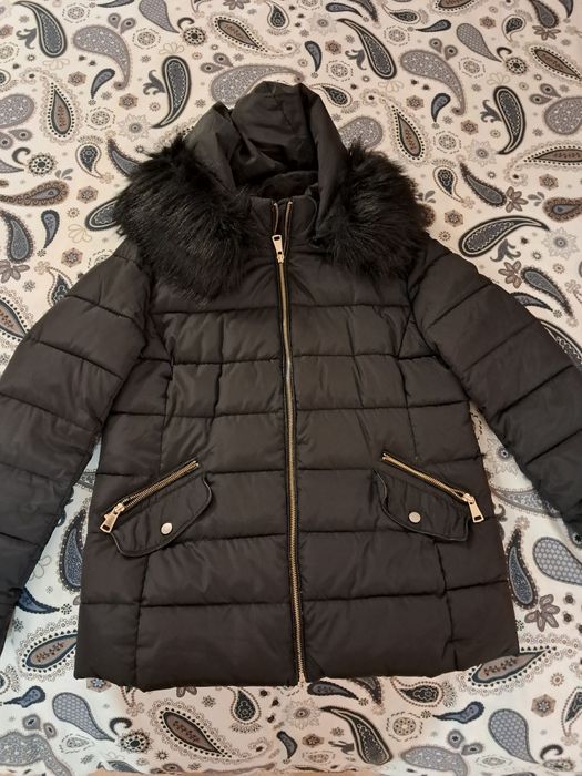 Quispo preto com carapuço