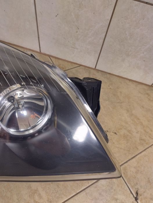 Opel Astra H 03-12 lampa reflektor prawy przód Europa wysyłka