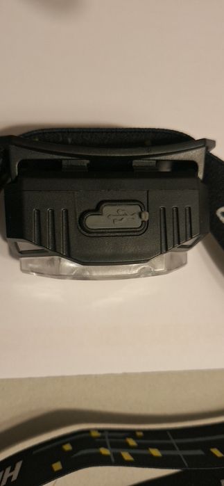 Lanterna de cabeça.