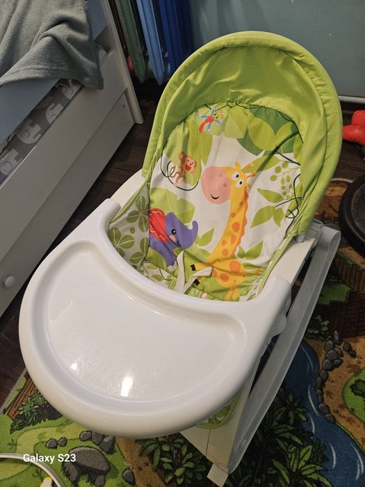 Leżaczek bujaczek dla dziecka z pałąkiem i stolikiem – bardzo dobry