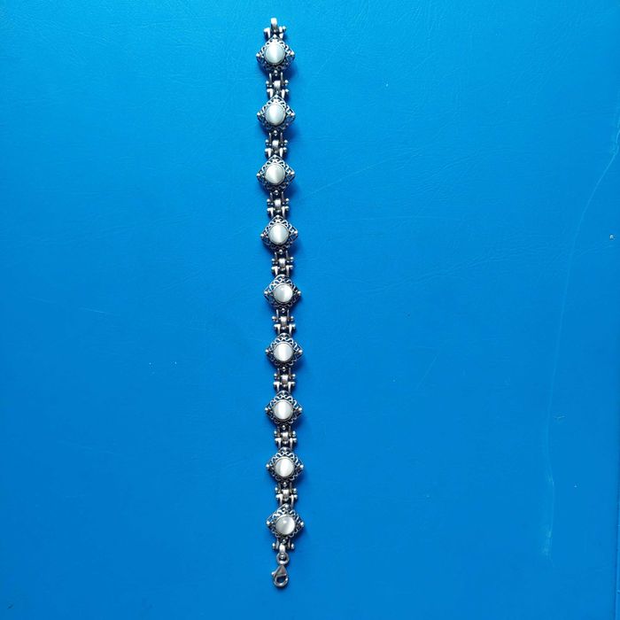 Bransoletka srebrna z oczkami