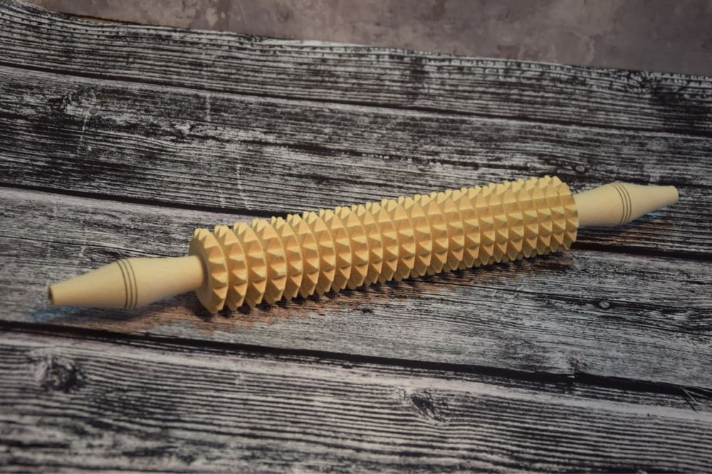 Масажер-качалка для тіла