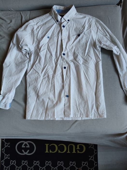 Sprzedam chłopięcą koszulę rozm.152