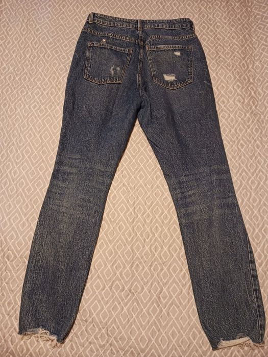 Calças de ganga rasgadas