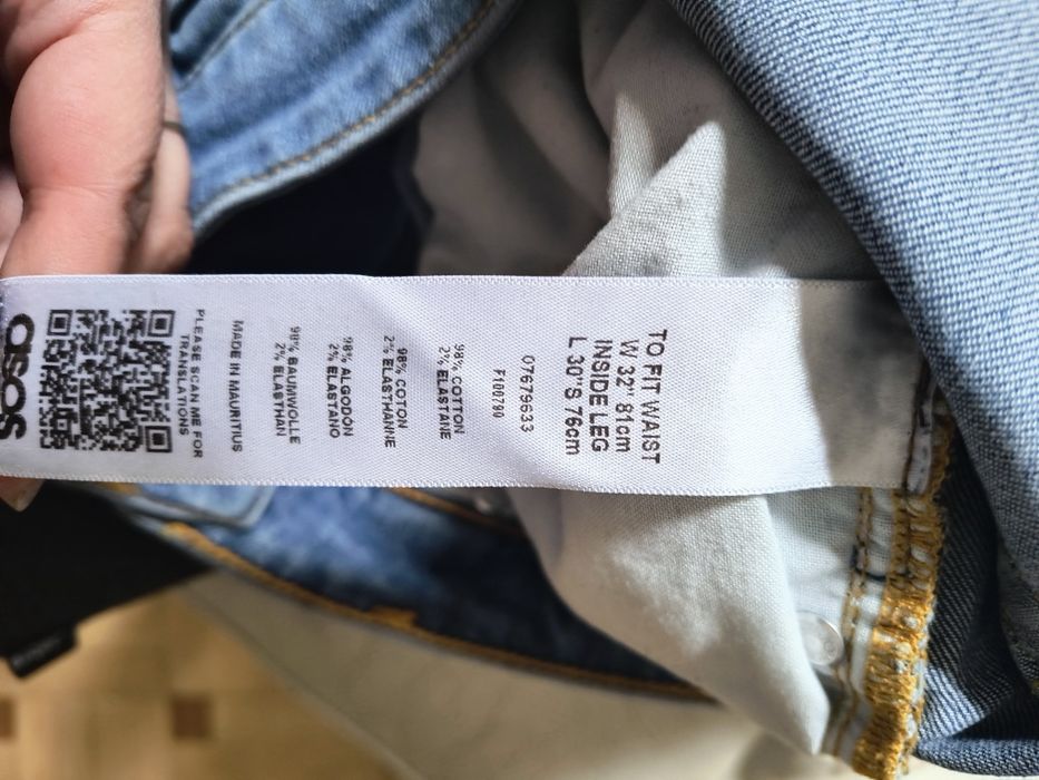 Jeansy męskie ASOS z dziurami W32 L30