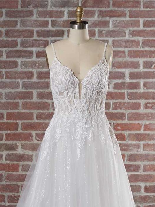 Zjawiskowa suknia ślubna z trenem