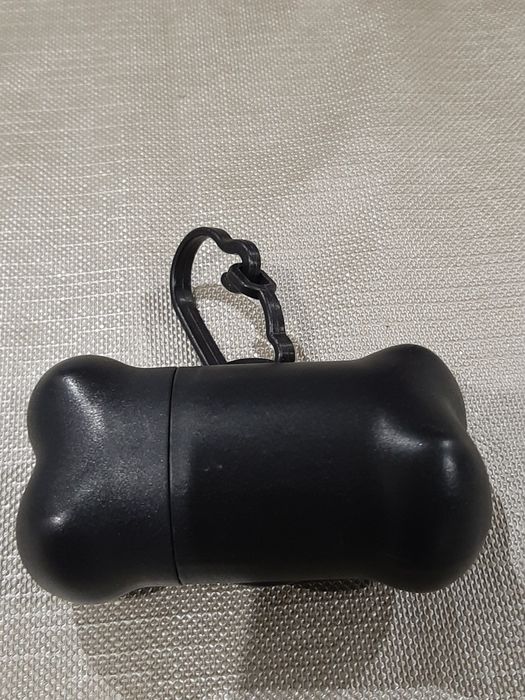 Dispensador de sacos para animais de estimação