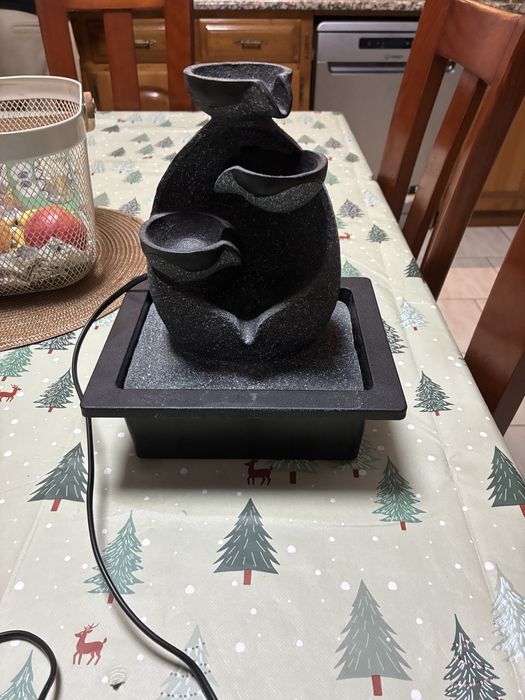 Fonte de agua com luz