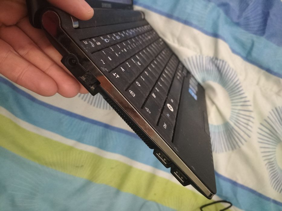 Computador com programa de bordados.