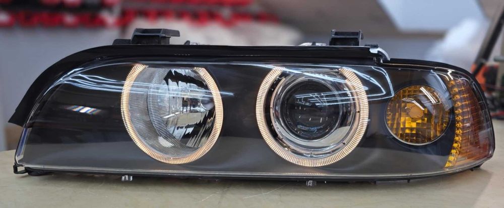 Reflektory Lampy BMW E39 Zregenerowane H7 HELLA EU