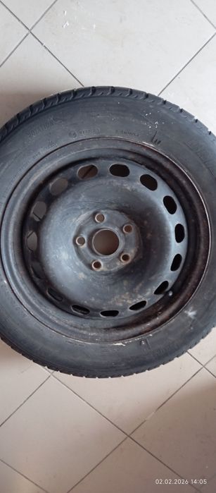Автомабильная шина і диск б/у 205/60R16  на запаску