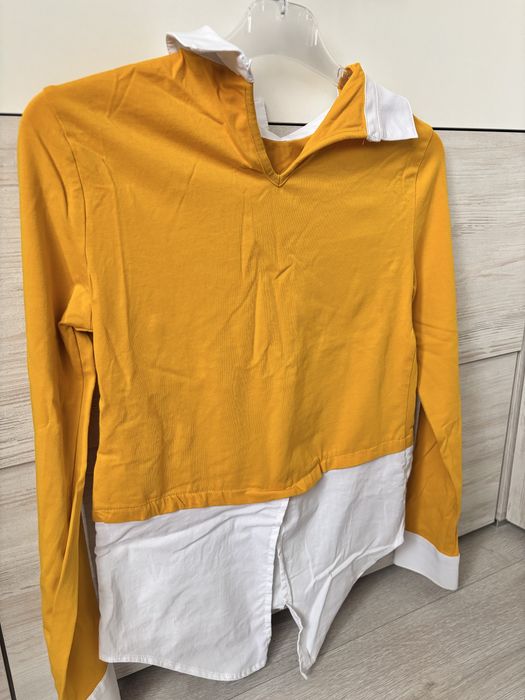 Блуза жіноча жовтого кольору .