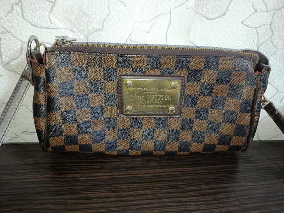 Кожаная сумочка клатч Louis Vuitton