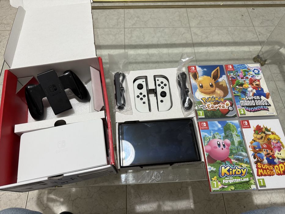 Nintendo switch oled com oferta de 4 jogos