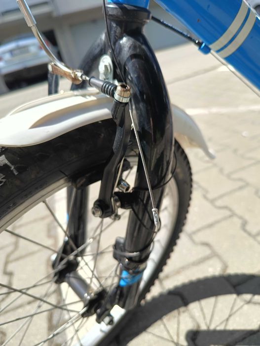 Sprzedam rower dziecięcy B'Twin Racing Boy 320 na kołach 20 cali.