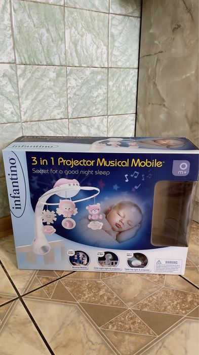 Музыкальный мобиль Infantino 3 в 1 с проектором розовый