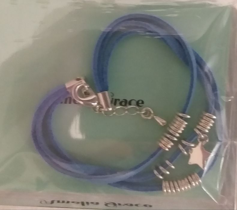 Pulseira c cordão de pele e Estrela em prata NUNCA USADO