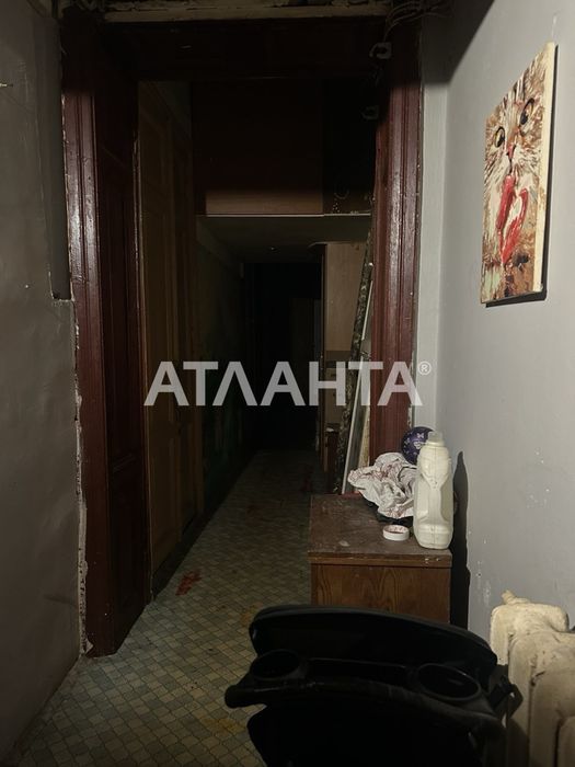 Продам двухуровневую комнату  в центре