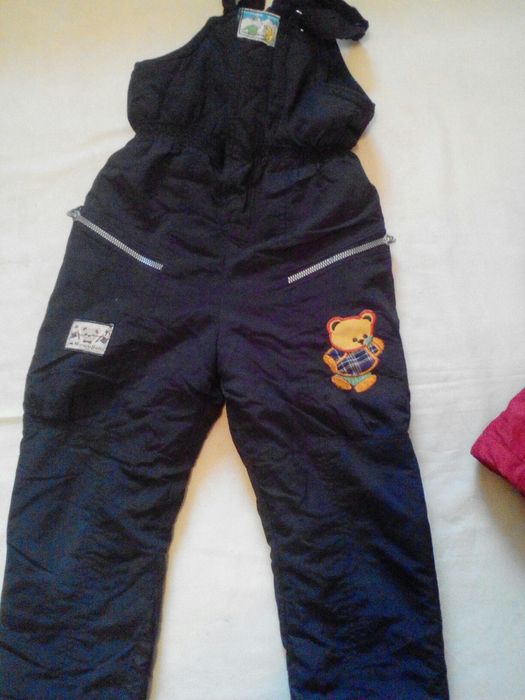 Продам зимний комбезик-пуховичок на дев.3-4 годика
