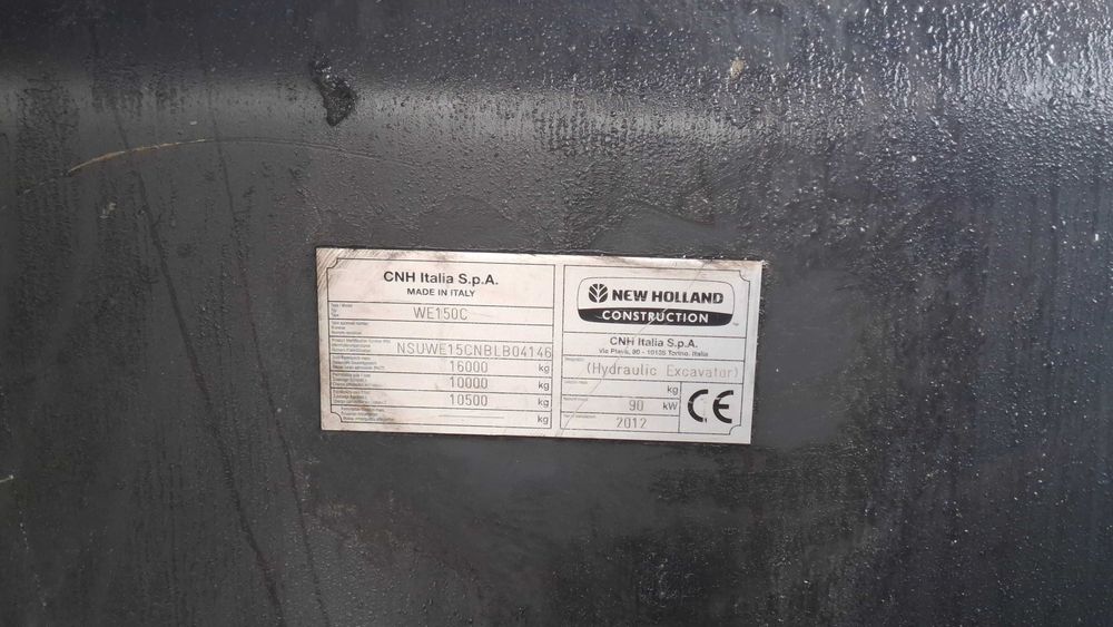 Koparka kołowa New Holland WE 150 C, 2012 r, podnoszona kabina.