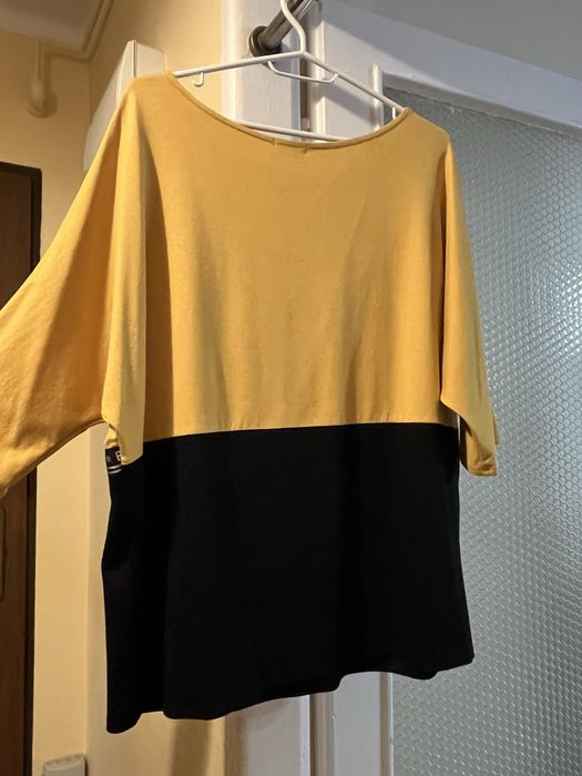 Żółta czarna bluzka nietoperz elegancka