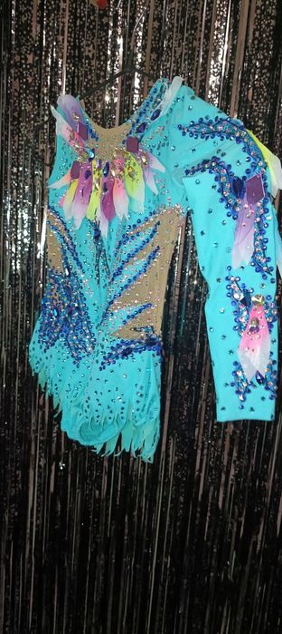 Купальники для художньої гімнаст з рукавомики
Оренда та продаж,