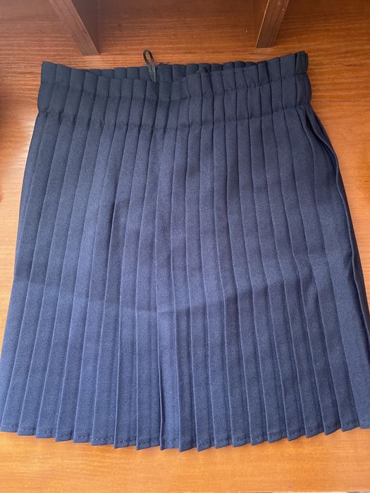 Шкільна спідниця або юбка шорти