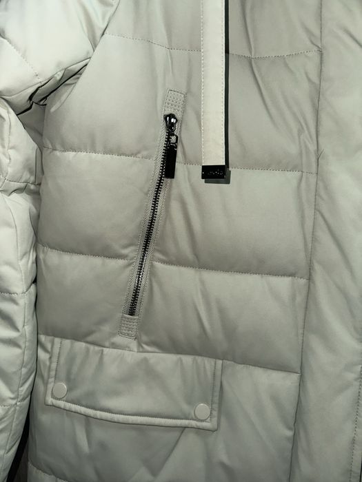 Продам женский зимний пуховик